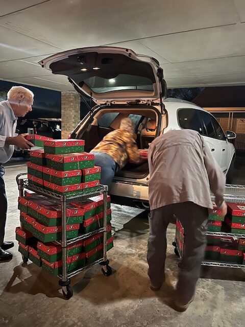 Calvary Baptist members unloading Operation Christmas Child boxes